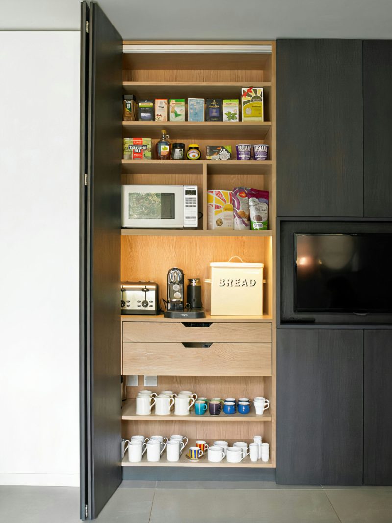 Bi-fold appliance garage
