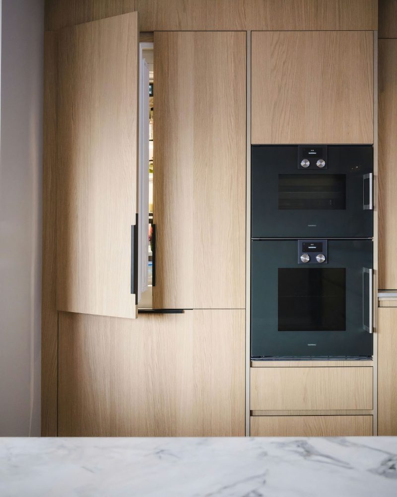 Panel-ready refrigerator with wood panels