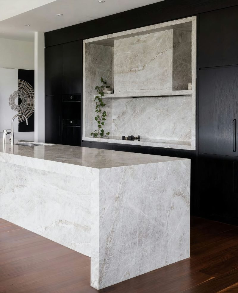 Stone range hood in kitchen design