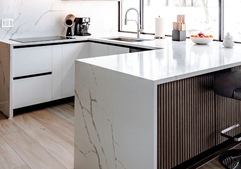 Kitchen island with fluted wood fronts
