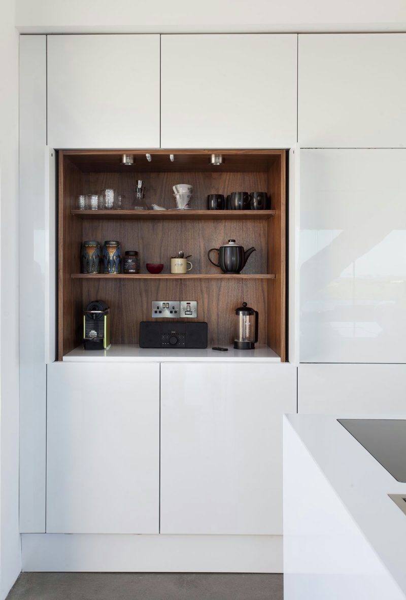 White kitchen with pocket doors