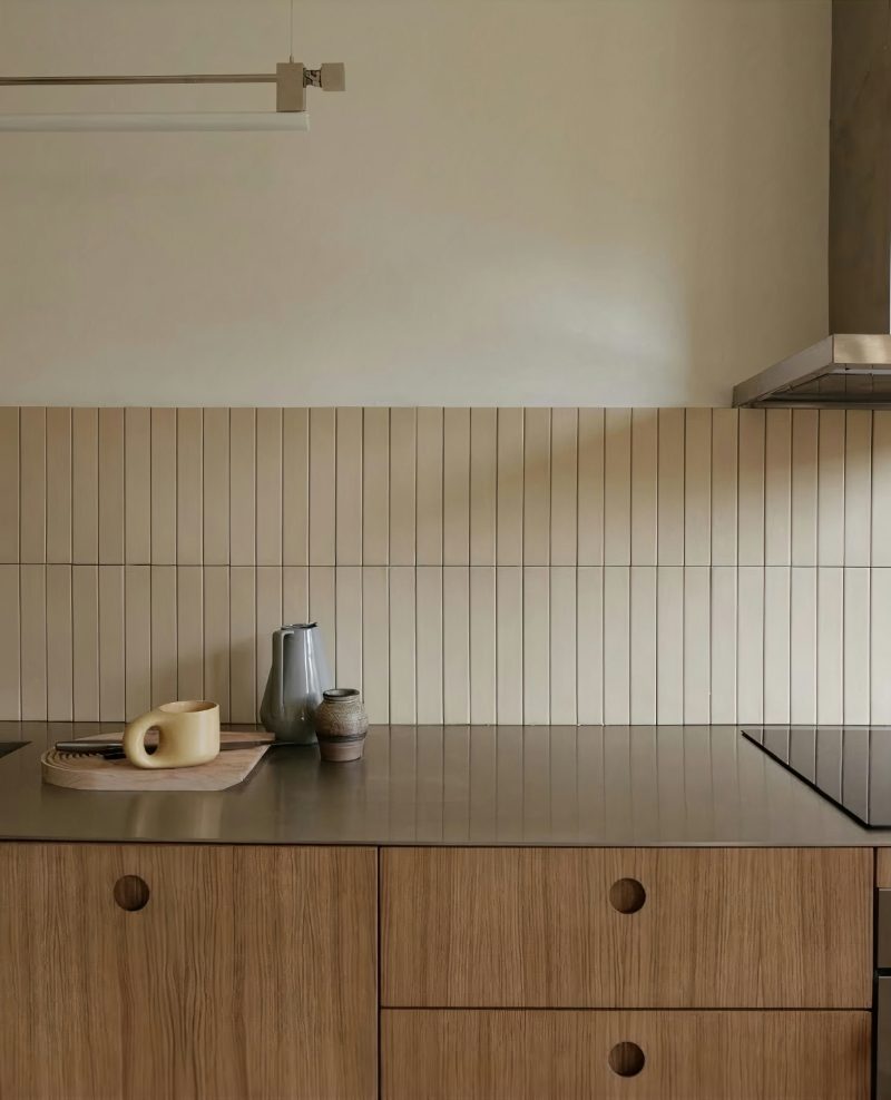 Stainless steel countertop with subway tiles