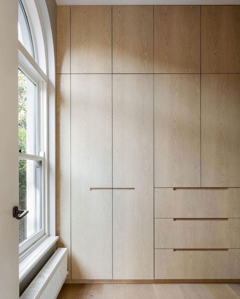 Cutout handle in wooden kitchen