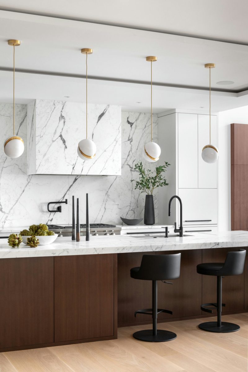 Stone range hood in kitchen design