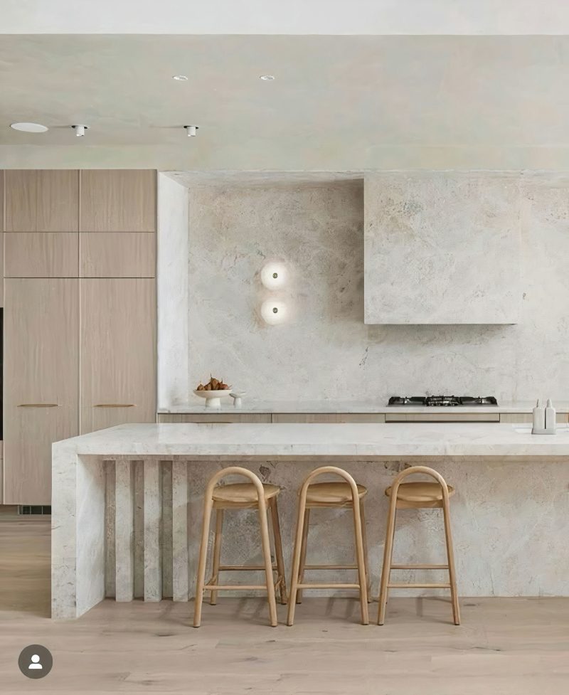 Stone range hood in kitchen design