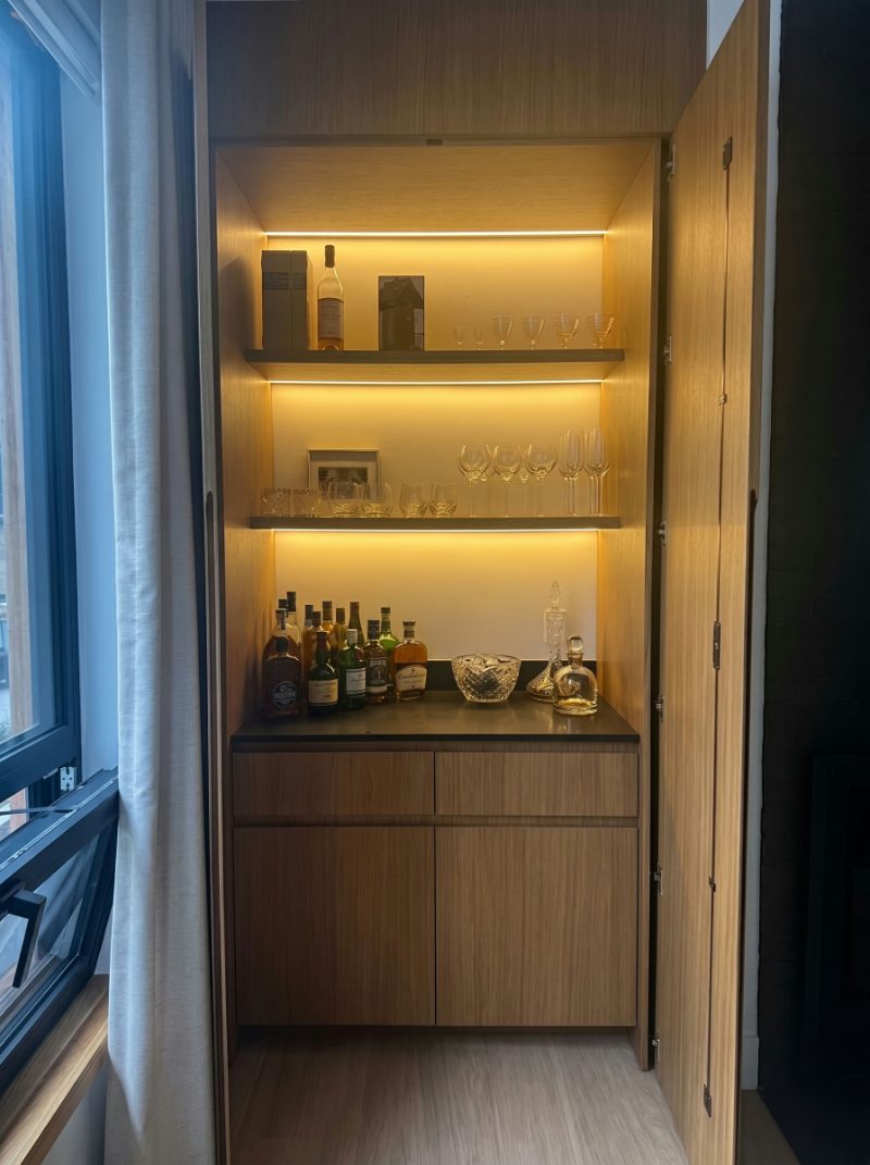 Bar cabinet with pocket doors