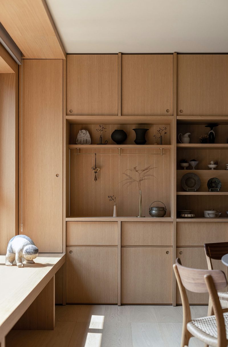 Cutout handle in light wood kitchen