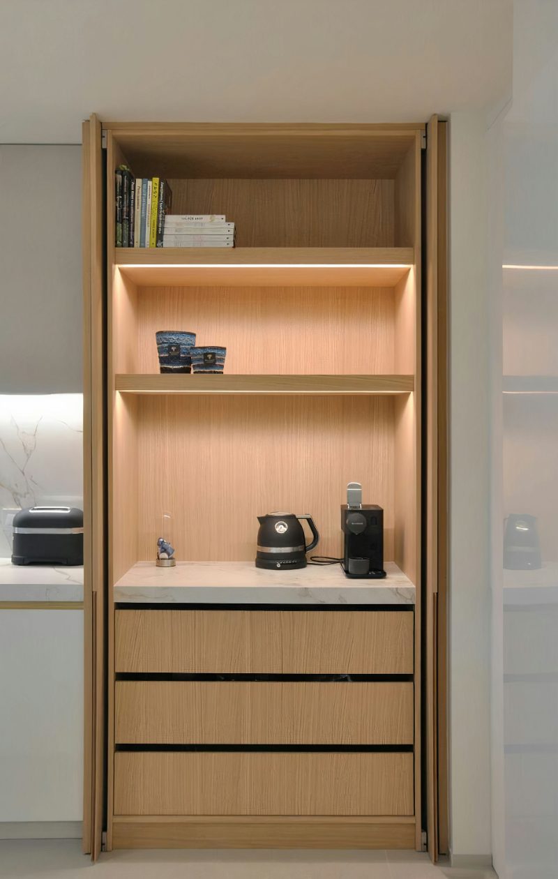 Appliance garage with pocket doors