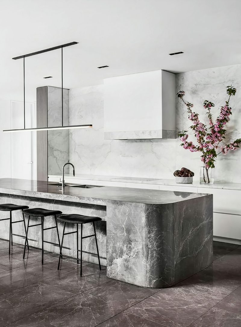 Stone range hood in kitchen design