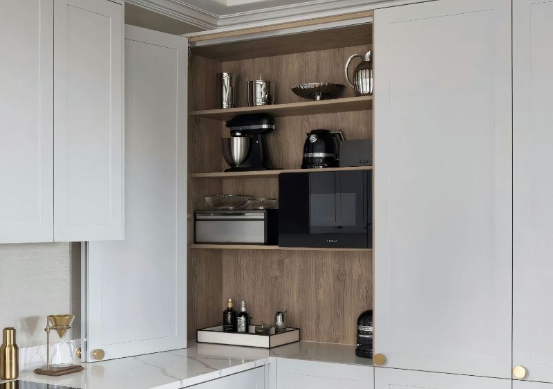 Bi-fold appliance garage