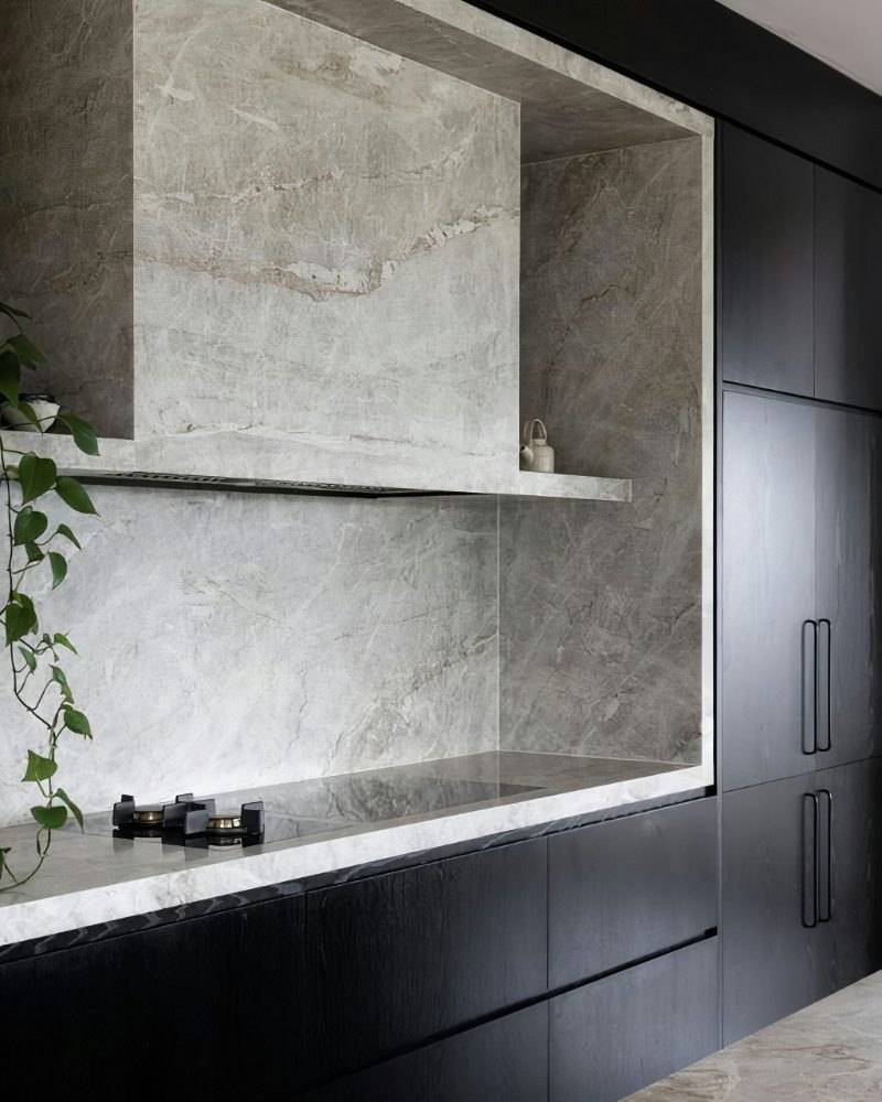 Stone range hood in kitchen design