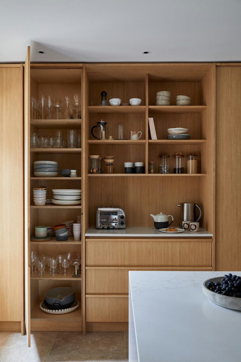 Appliance garage with pocket doors
