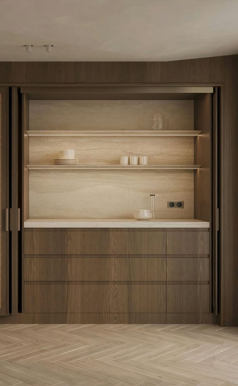 Dark wood kitchen with pocket doors